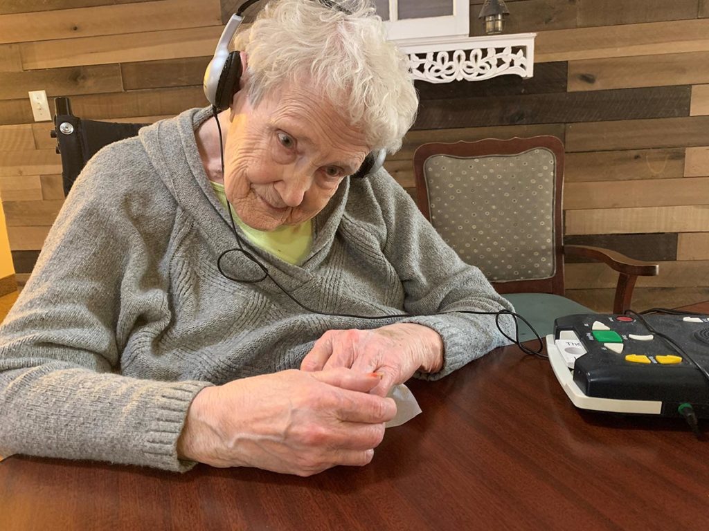 Jo reading at any age with an audio book player